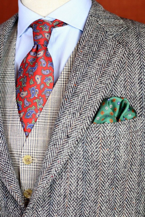 A sophisticated combination of paisleys and tweed with a lush green accent.