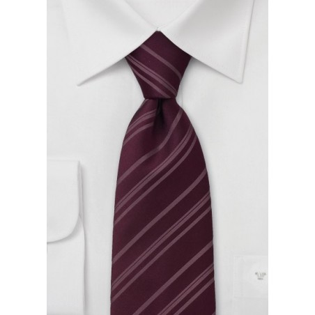 Striped burgundy color silk tie  -  Burgundy red necktie with fine stripes