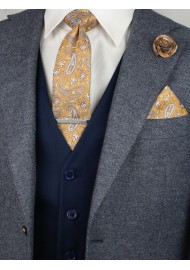 Matching caramel paisley necktie and pocket square