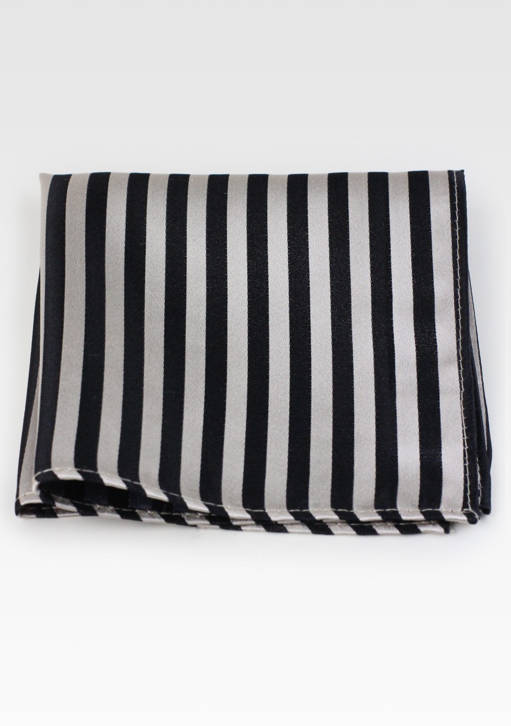 Striped pocket square in black and champagne in pure silk