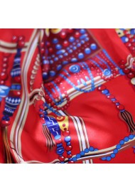 Red Ladies Scarf with Ancient Tribal Jewelry Print in Gold Detailed Close Up