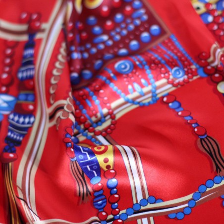 Red Ladies Scarf with Ancient Tribal Jewelry Print in Gold Detailed Close Up