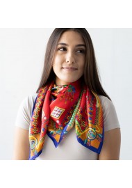 Red Silk Scarf with Gold and Blue Design Accents Styled