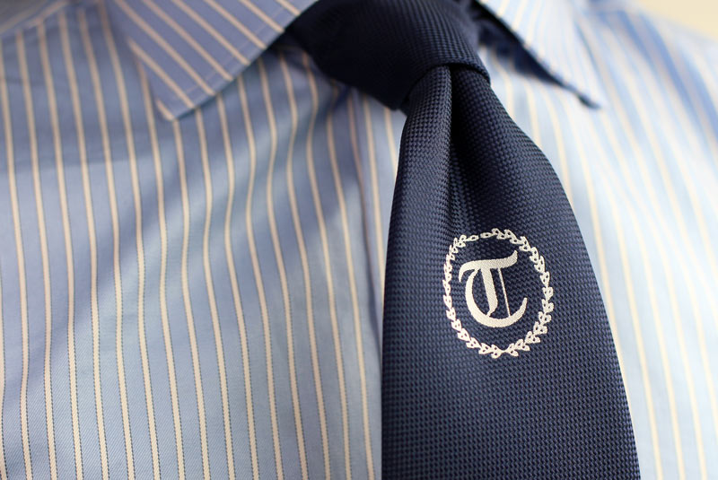 custom ties logo embroidered below knot